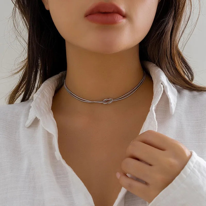 NUDETA-COLLAR